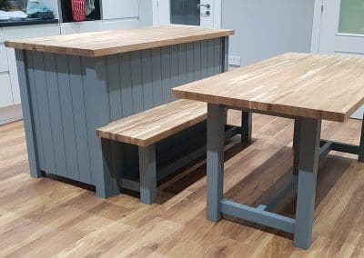 Kitchen island with table and bench